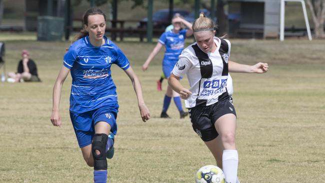 IN CONTROL: Joyce De Wit, Rockville and Willowburn’s Courtney Morris (right) dribbles past Rockville’s Joyce De Wit during a match earlier this year.