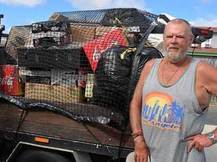 Peter Coote recycles at Biggenden to raise money for research into motor neurone disease. Picture: Erica Murree