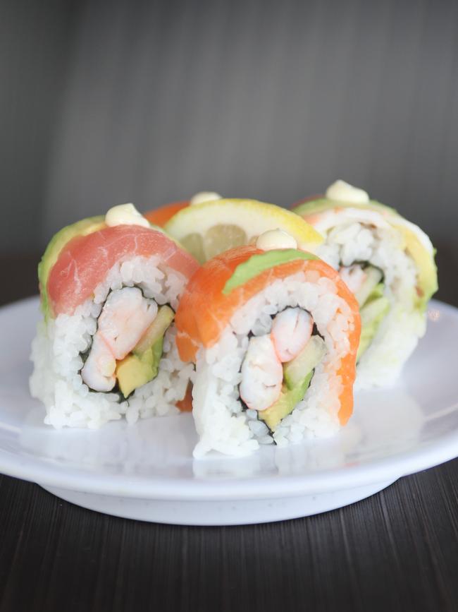 Its Rainbow Roll. Fresh tuna, salmon and kingfish with avocado, prawn and cucumber.