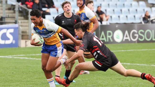 Marcellus Iakopo playing league with his school. Photo: Tim Pascoe