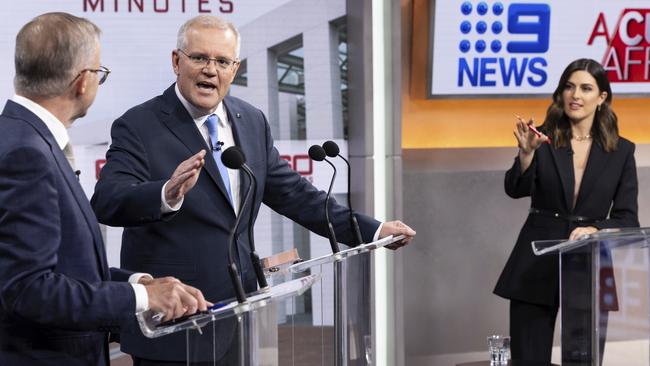 Much of the debate looked like this, with the two men bickering while Sarah Abo tried to restore a little order. Picture: Alex Ellinghausen/Getty Images