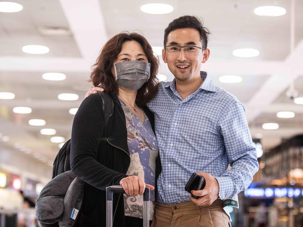 Lu Chong and her son William arrived from Beijing at Sydney International Airport. Picture: Daily Telegraph/Flavio Brancaleone