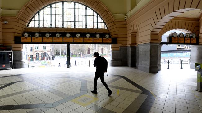 Flinders Street Station is all but deserted during stage 4 lockdown. Picture: NCA NewsWire / Andrew Henshaw