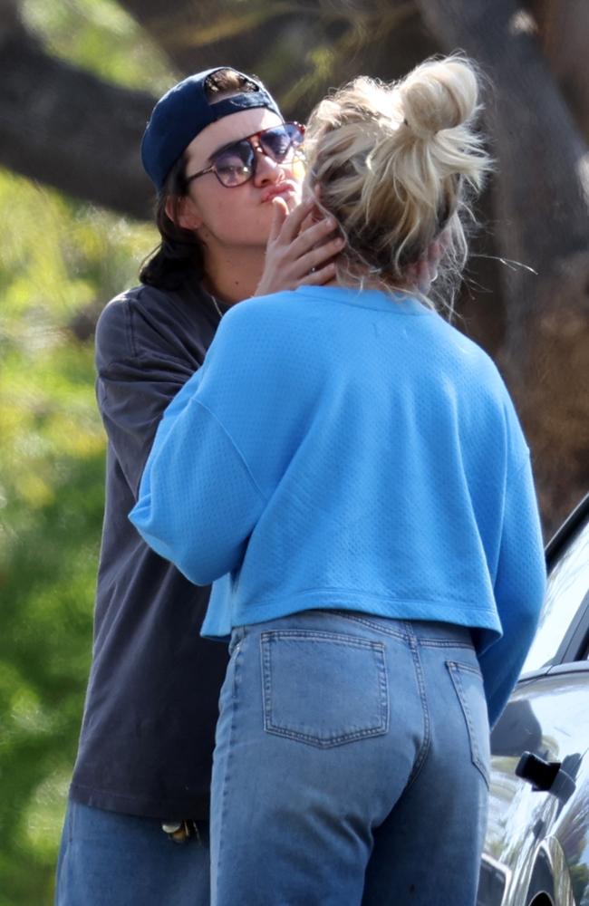 The pair were kissing and hugging, seemingly reluctant to say goodbye after the outing. Picture: BACKGRID