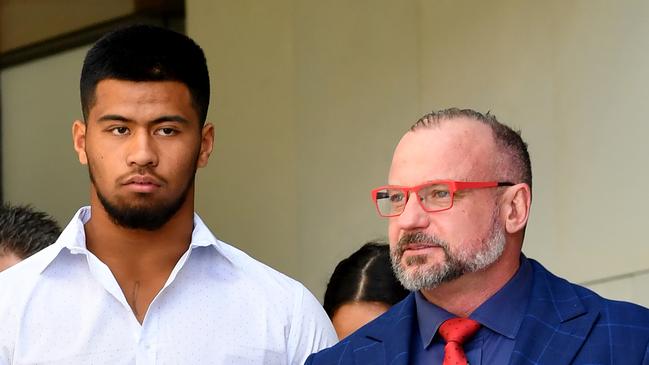 Brisbane Broncos NRL player Payne Haas (left) is seen leaving the Ipswich Magistrates Court this morning. Picture: Darren England/AAP 