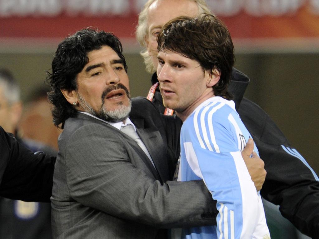 Diego Maradona, left, hugs Argentina's striker Lionel Messi after the 2010 World Cup quarterfinal between Argentina vs. Germany. Picture: AFP