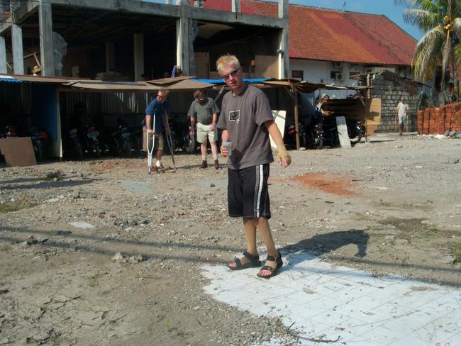 Dale Atkin returns to the site of the destroyed Sari Club six months after the blast. Here he points at the spot where he was located when the bomb went off. Picture: Supplied