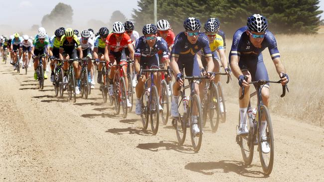 Herald Sun Tour riders battle along a gravel road. Picture: Michael Klein