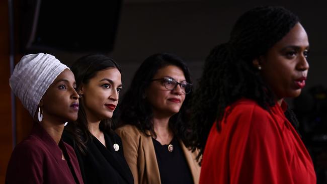 TOPSHOT - US Representatives Ayanna Pressley (D-MA) speaks as, Ilhan Abdullahi Omar (D-MN)(L), Rashida Tlaib (D-MI) (2R), and Alexandria Ocasio-Cortez (D-NY) hold a press conference, to address remarks made by US President Donald Trump earlier in the day, at the US Capitol in Washington, DC on July 15, 2019. - President Donald Trump stepped up his attacks on four progressive Democratic congresswomen, saying if they're not happy in the United States "they can leave." (Photo by Brendan Smialowski / AFP)