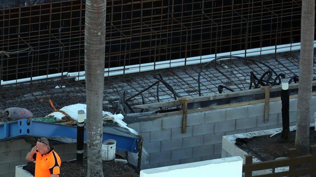 The cable of a crane opperating at QUBE Broadbeach snapped this afternoon. About half of the cable landed in the yet to be completed swimming pool. Photo by Richard Gosling