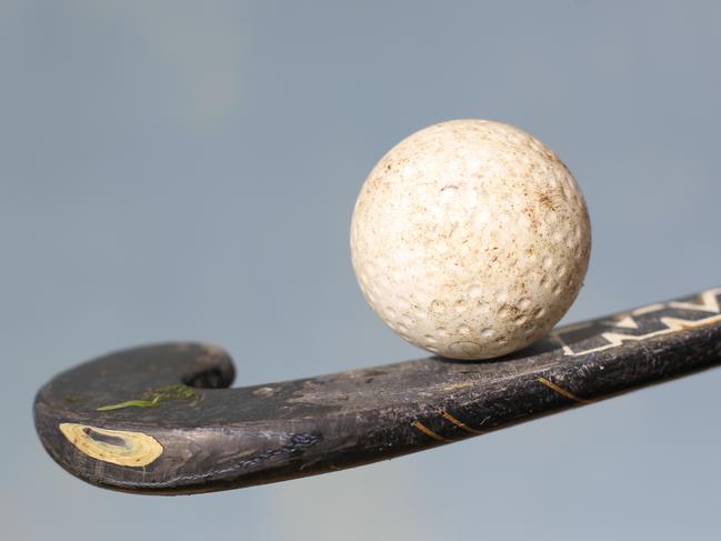 Generic shots of hockey ball and stick