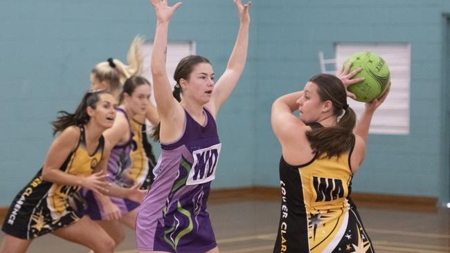 Action from 2019 regonal netball open semi-final between Lower Clarence and Grafton at Grafton Sports Centre.