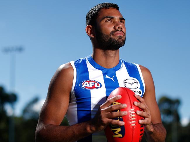 MELBOURNE, AUSTRALIA - FEBRUARY 17: Tarryn Thomas of the Kangaroos poses for a photograph during the North Melbourne Kangaroos 2022 Official Team Photo Day at Arden Street on February 17, 2022 in Sydney, Australia. (Photo by Michael Willson/AFL Photos)