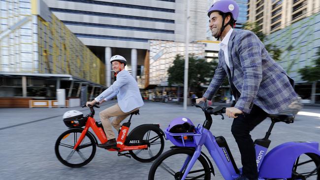 Jayden Bryant from Neuron mobility and Tom Cooper, Beam Mobility on new electric bikes. Picture: Josh Woning