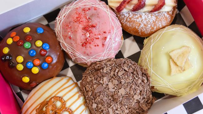 Mt Eliza couple Ben Swan and Hayley Bradley make delightful doughnuts that has everyone talking. Picture: Josie Hayden