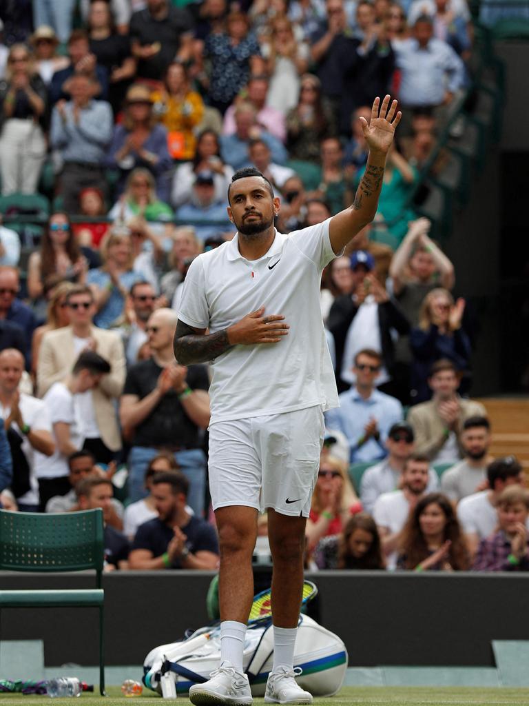 Kyrgios waves to the crowd.