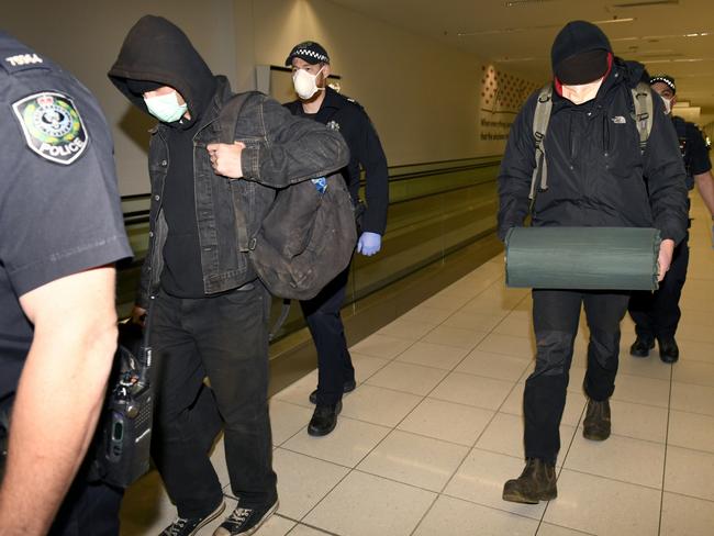 The men are sent packing back to Victoria. Picture: NCA NewsWire/Naomi Jellicoe