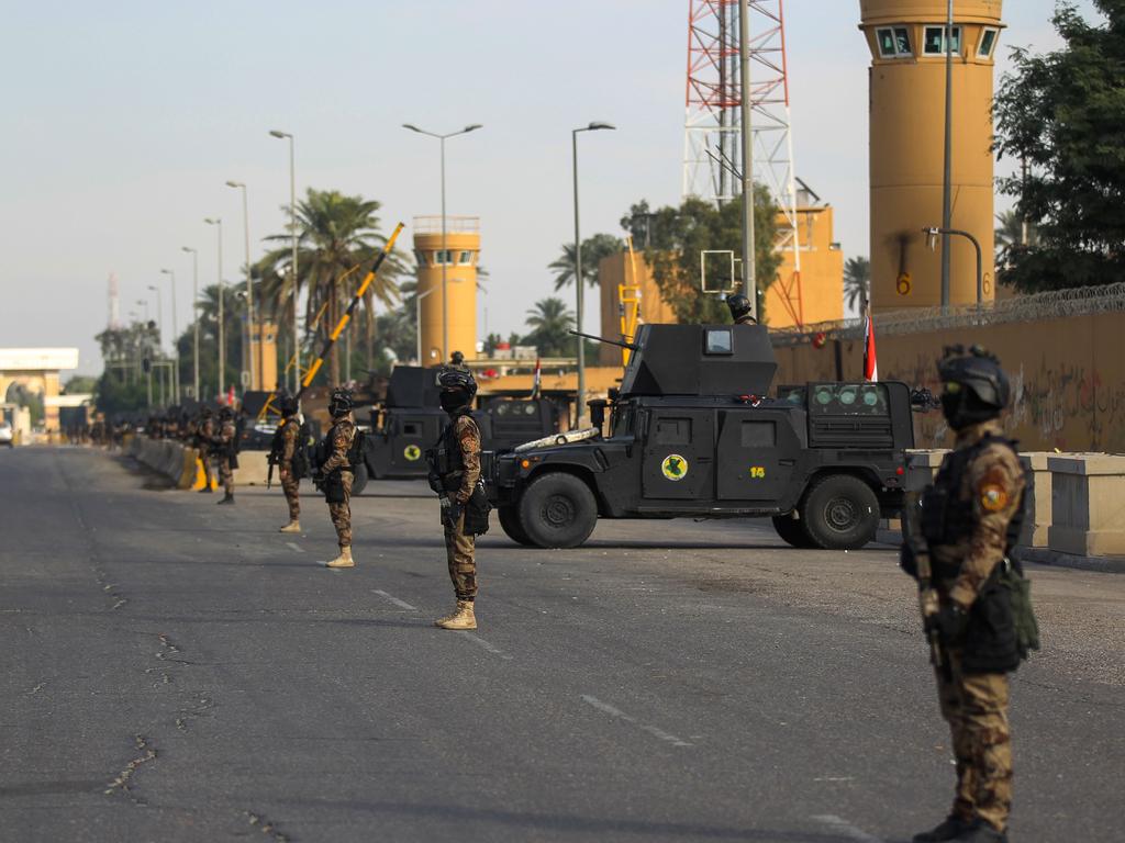 Soldiers at the US embassy in Baghdad after it was attacked. Picture: Ahmad Al-Rubaye/AFP