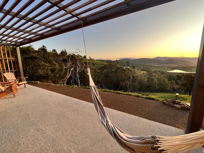 A hammock outside one of the luxury, off-grid eco pods at Aquila Glamping. Picture: Supplied.