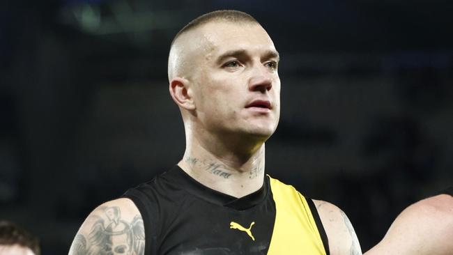 MELBOURNE, AUSTRALIA - AUGUST 03: Noah Balta, Jack Graham, Dustin Martin and Nathan Broad of the Tigers look dejected after the round 21 AFL match between North Melbourne Kangaroos and Richmond Tigers at Marvel Stadium, on August 03, 2024, in Melbourne, Australia. (Photo by Daniel Pockett/Getty Images)