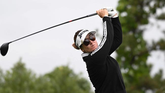 Hannah Green tees off. (Photo by Jung Yeon-je / AFP)