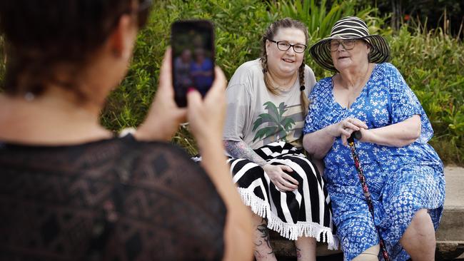 Kay Henderson pictured with family and friends going for a final swim at Coffs Harbour. Picture: Sam Ruttyn