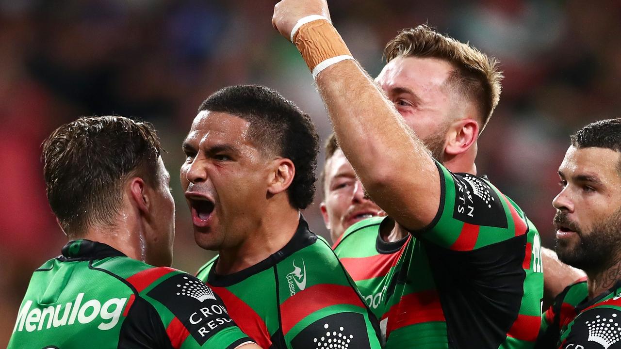 BRISBANE, AUSTRALIA - OCTOBER 03: Cody Walker of the Rabbitohs celebrates with his teammates after scoring a try during the 2021 NRL Grand Final match between the Penrith Panthers and the South Sydney Rabbitohs at Suncorp Stadium on October 03, 2021, in Brisbane, Australia. (Photo by Chris Hyde/Getty Images)