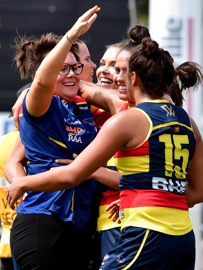 Former Crows coach Bec Goddard congratulates players after a win. Picture: Bianca De Marchi