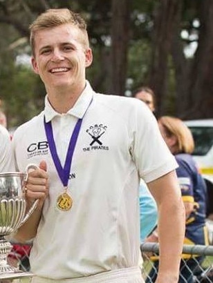 Will Crowder celebrates Peninsula Old Boys' 2015-16 premiership.