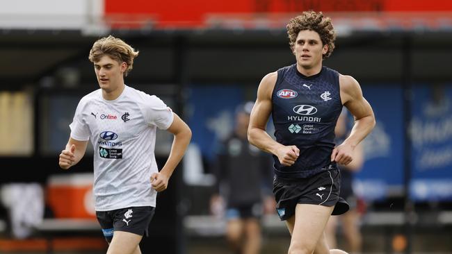 Charlie Curnow, right, is put through a fitness test. Picture: Michael Klein