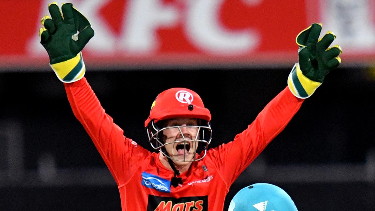 Sam Harper (left) appeals for a wicket from behind the stumps.