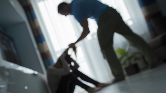 A tradie thug pulled his partner down the stairs by her hair, choked her and threw her into a wardrobe. Generic image