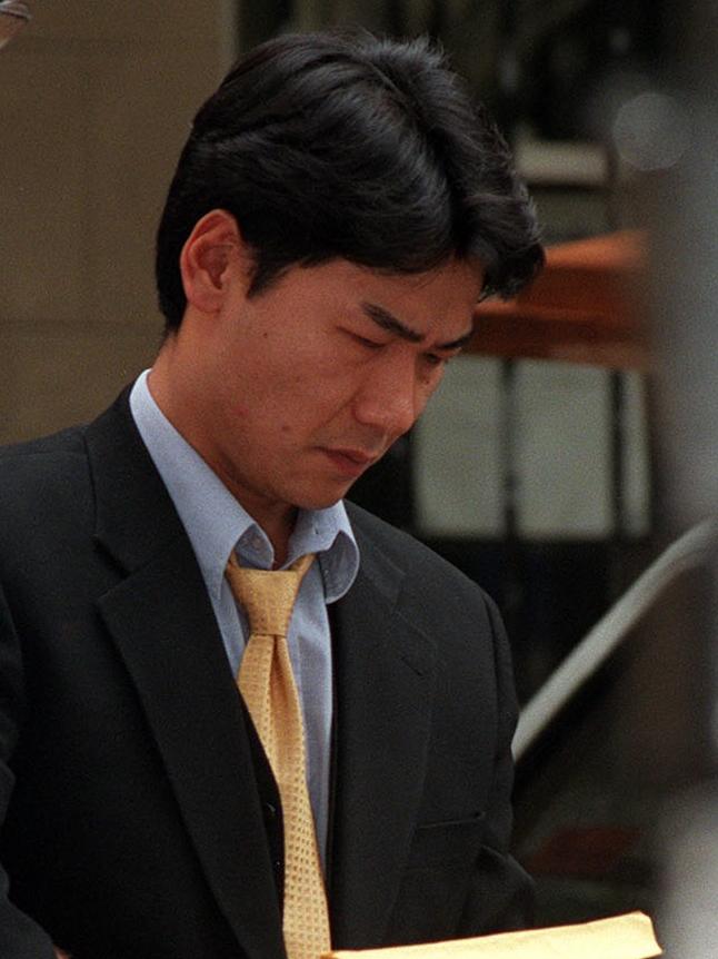 Nick (Sung Eun) Park leaves NSW Supreme Court in handcuffs after being convicted of murder of wife Susan and children. Picture Bill Counsell.