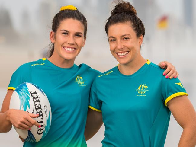 Charlotte Caslick and Emilee Cherry of the Australian Women's Sevens team on Nobby's Beach, Gold Coast, ahead of the 2018 Commonwealth Games. Photo: RUGBY.com.au/Stuart Walmsley