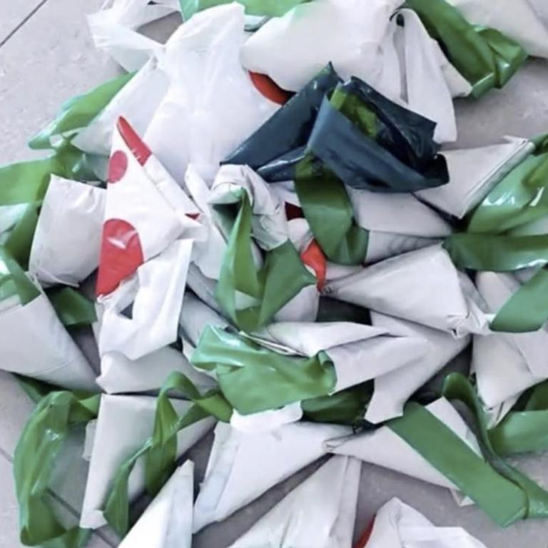 TikTokker Emmy used a popular folding hack to store reusable plastic bags, but supermarket workers claimed it was a ‘pain’ to undo them at registers. Picture: TikTok/@emmy.m