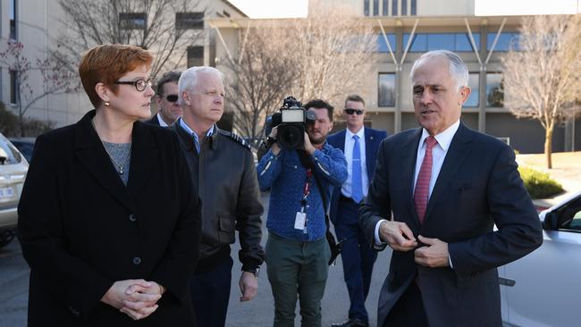 Prime Minister Malcolm Turnbull, Australian Defence Minister Marise Payne and Chief of the Defence Force Mark Binskin arrive for a confidential briefing on North Korea in Canberra yesterday.