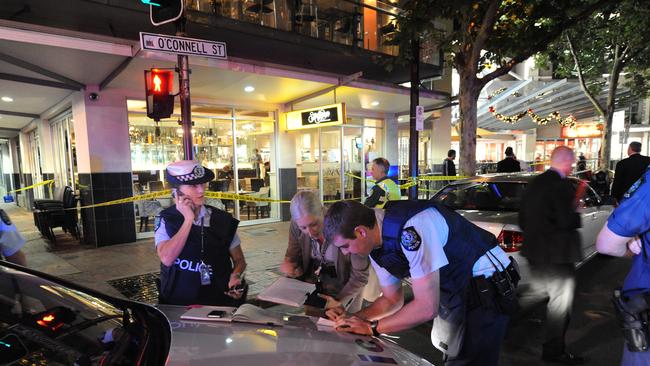 Police outside Cafe Paesano after the bikie shooting in 2011.