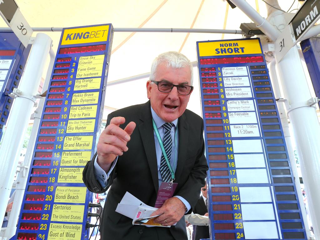 Bookmaker Norm Short in the betting ring. Norm has been a bookie for 30 years at Flemington. Picture: Ian Currie