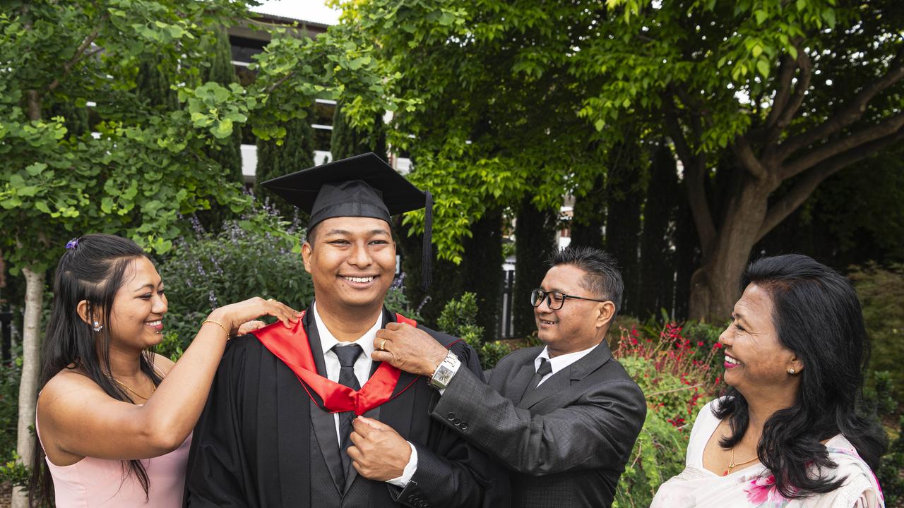 Master of Cyber Security graduate Danyu Rajbahak with sister Neki Rajbahak, dad Dev Kumar Rajbahak and mum Neki Rajbahak at a UniSQ graduation ceremony at The Empire, Wednesday, October 30, 2024. Picture: Kevin Farmer