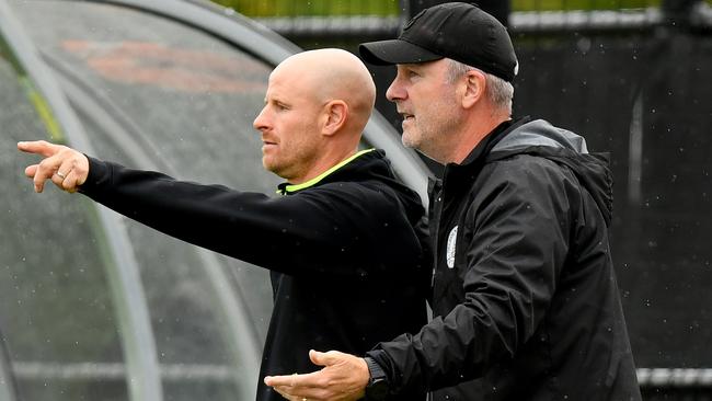 Melbourne Knights coach Ben Surey (left) gives instructions. Picture: Josh Chadwick