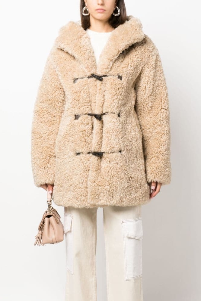 <p><strong>Marant &Eacute;toile faux-fur hooded coat</strong></p><p class="button-common"><a title="SHOP NOW FOR $1353" href="https://www.farfetch.com/au/shopping/women/marant-etoile-faux-fur-hooded-coat-item-19906715.aspx" target="_blank" data-cta="SHOP NOW FOR $1353" data-editable="true">SHOP NOW FOR $1353</a></p>