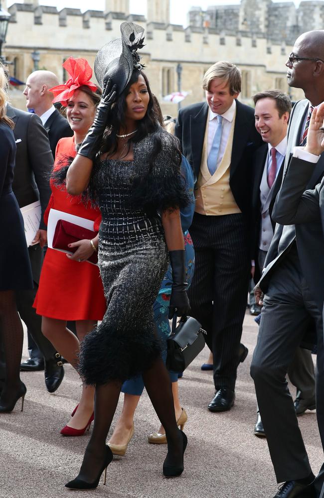 People say you shouldn’t wear black to a wedding. But Naomi Campbell does what she damn well wants, as shown by her outfit choice. If somebody had kicked the bucket at the wedding, she could have gone seamlessly into (chic) mourning.