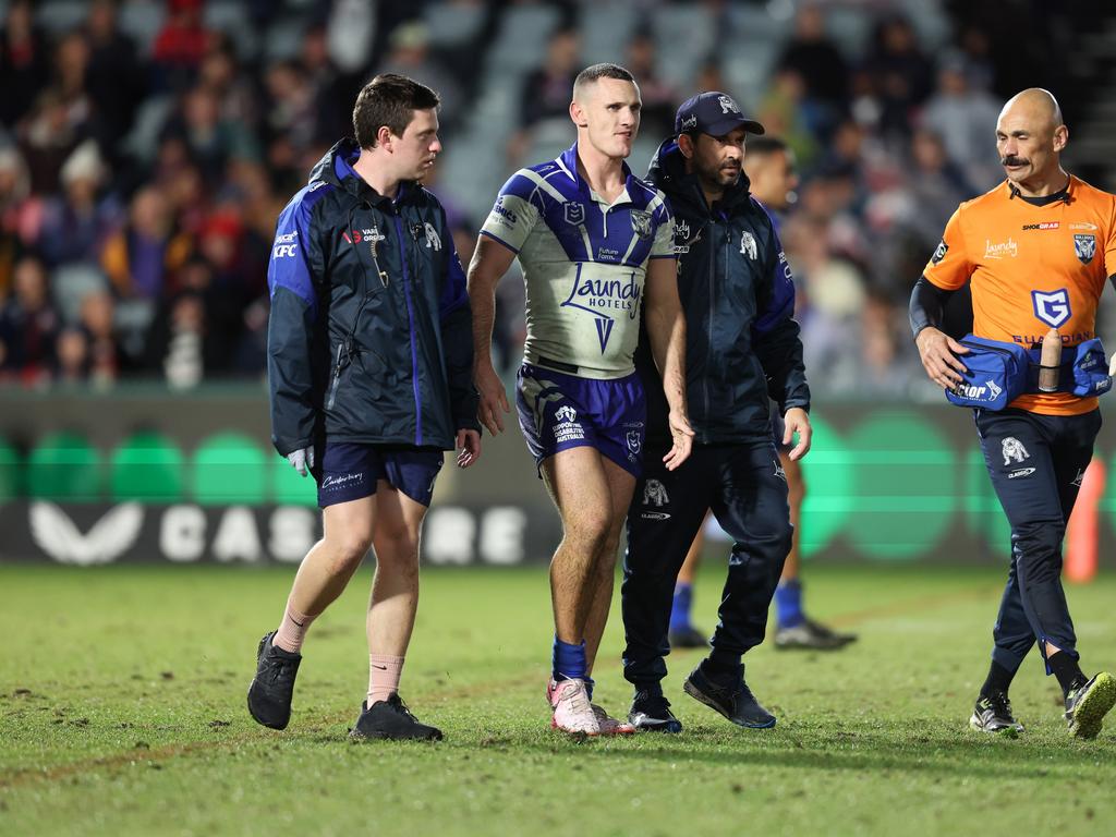 Connor Tracey was assisted from the field after the ugly high shot from Pauge. Picture: Getty Images