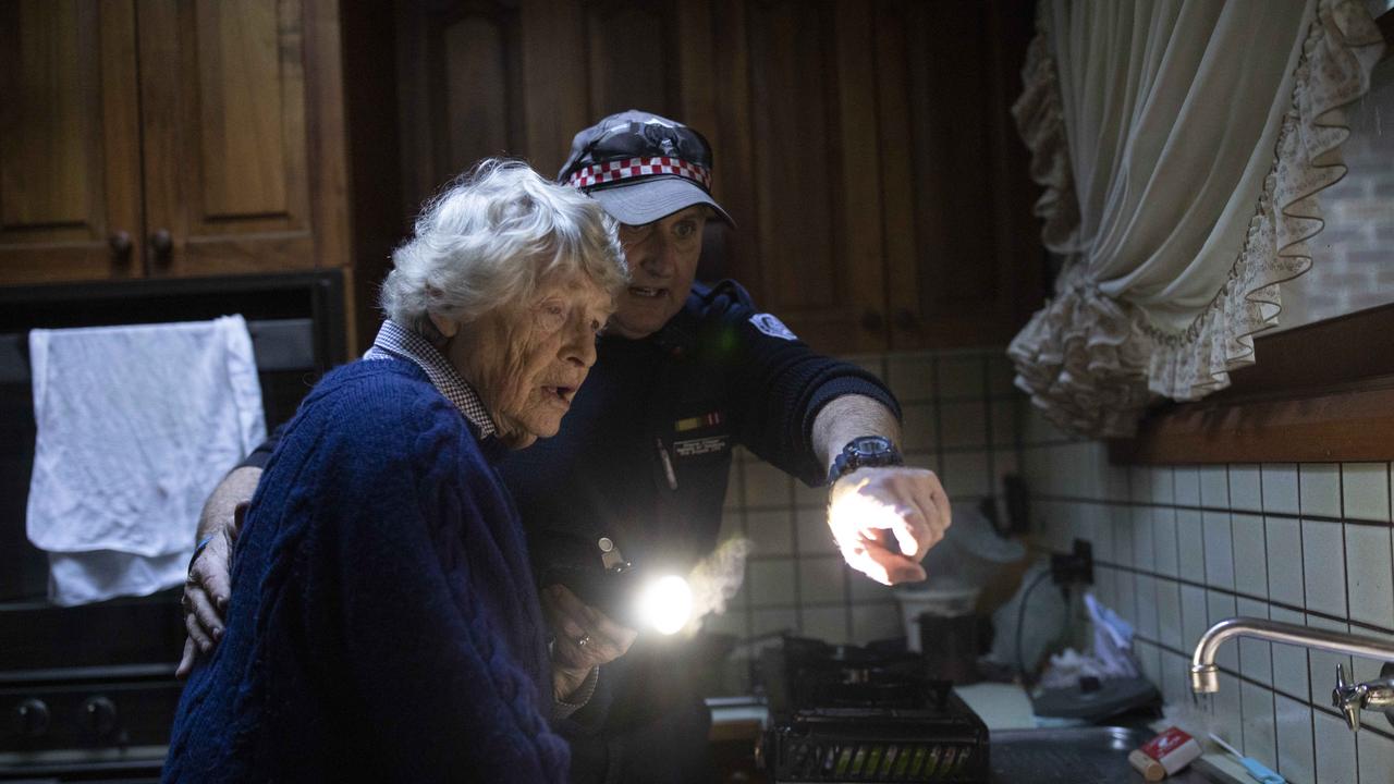 CFA volunteer Shayne O'Dwyer helps Merlyn Edgar in her Kalorama home. Picture: Arsineh Houspian