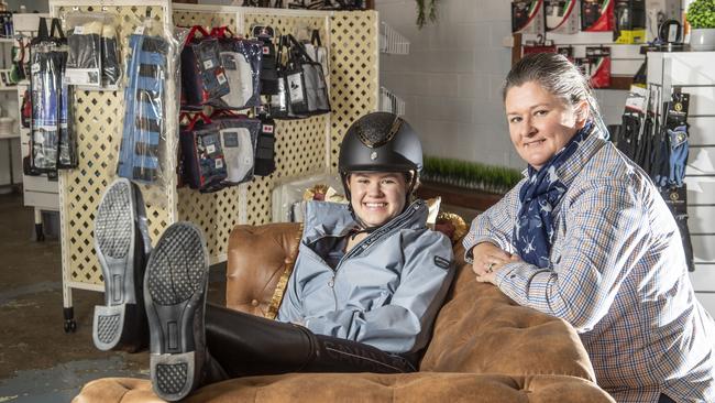 Prinnie Thomas with her mother Amy Thomas. The Horse Den has opened in Railway St offering saddlery and clothing. Monday, September 5, 2022. Picture: Nev Madsen.