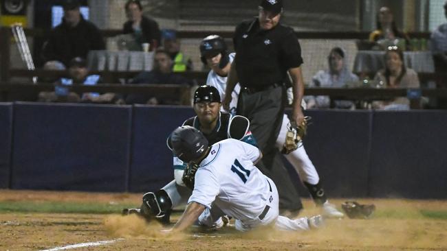 Always a tough competitor. Trent D'Antonio sliding to base vs Tuatara. Photo: Mick G Photography