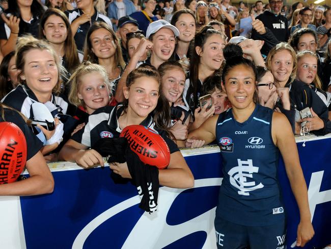 Darcy Vescio with the crowd when AFLW debuted in 2017. Crowds have been steady at over 6,000 per match.