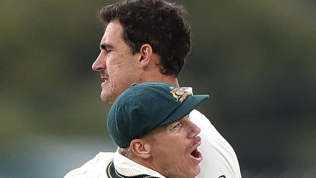 Mitchell Starc and David Warner in happier times.