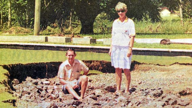 1999 FLOOD KAndanga bowls club junior bowler Matthew Warne and the club's Australian  representive Jenny Harragon stan in the middle of a huge hole in the Kandanga  Club's green caused by the Fedruary flood, despite the set back , the small Mary Valley club played bowls the following week. Picture: Renee Albrecht