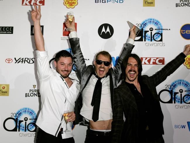 (L-R) Members of Silverchair Chris Joannou, Daniel Johns and Ben Gillies pose with their awards at the 2007 ARIA Awards at Acer Arena on October 28, 2007 in Sydney, Australia. The 21st annual Australian Recording Industry Association (ARIA) Awards recognise excellence and innovation across all genres of Australian music, and are a culmination of an events season which includes the ARIA Hall of Fame and the ARIA Fine Arts Awards. There are 28 awards categories, 26 of which are voted for by the musician's peers and 2 are a result of audited sales results. (Photo by Don Arnold/WireImage)